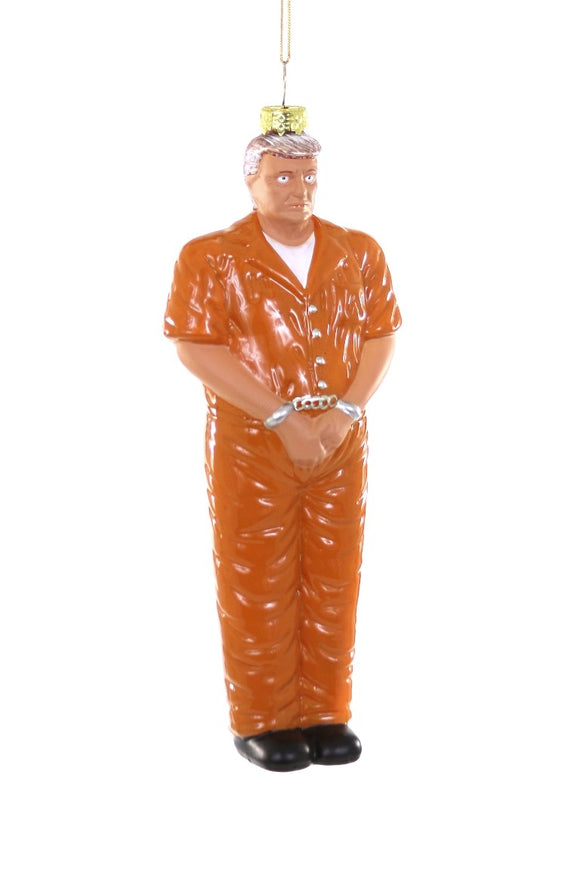 Juleornament i glas af Donald Trump i orange fangedragt med håndjern, håndmalet af Cody Foster & Co