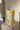 Pomfrit vase fra Kersten, på travertinsokkel i galleri-stil